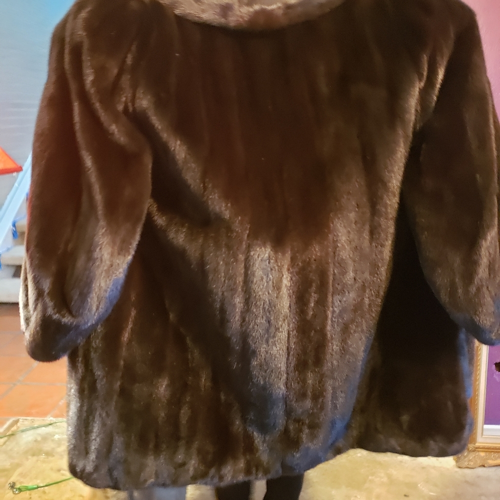 Beautiful stroller length mink coat.